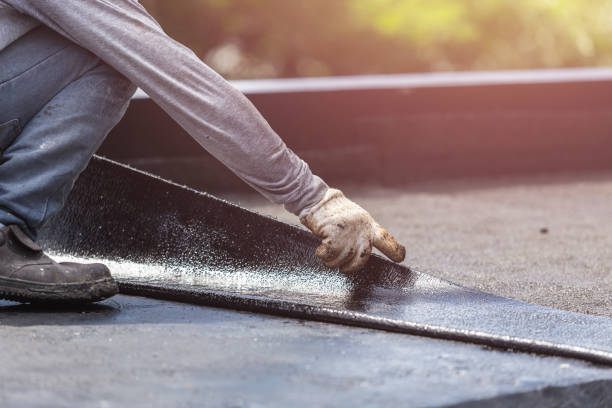 Professional Waterproofing technician working in Brookeville, MD
